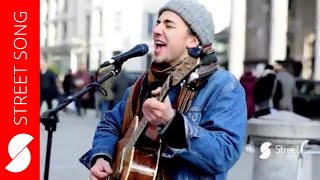 Street performer Jack Elliott sings Volcano by Damien Rice