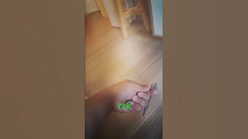 Butterfly Knife Balisong Trick Y2K roll over