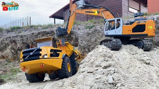 RC Mine Working Hydraulic Excavator 945, Truck Volvo A60, Mack, Huina 1599 | Cars Trucks 4 Fun