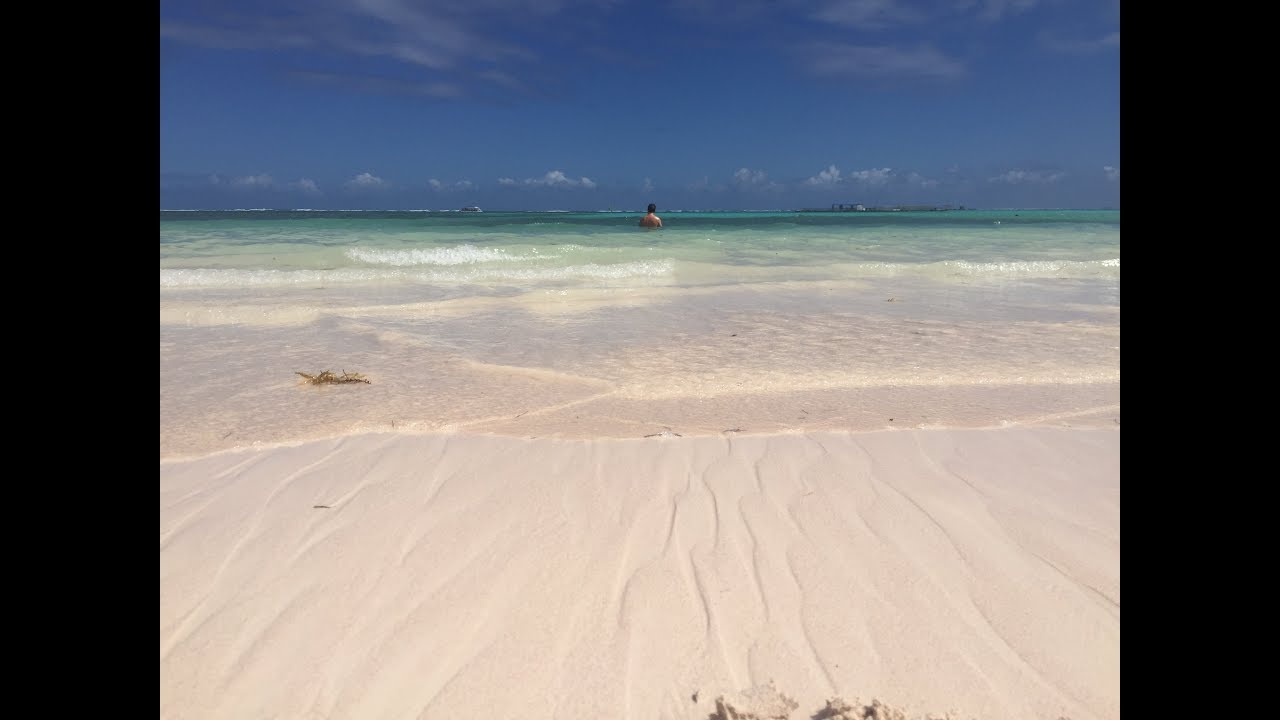 Grace Bay Beach Turks and Caicos or Royal Caribbean’s Freedom of the Seas Cruise to ABC Islands vision loss migraine