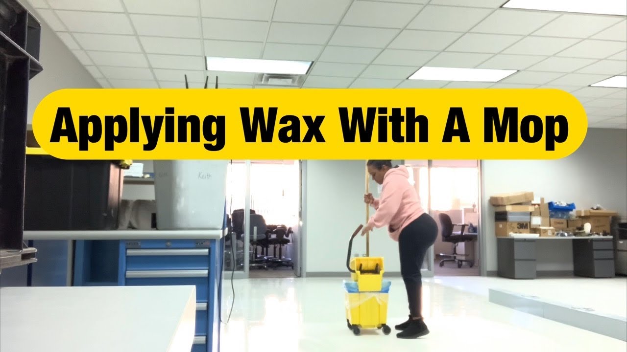 Female Applying Wax To Freshly Stripped Floors