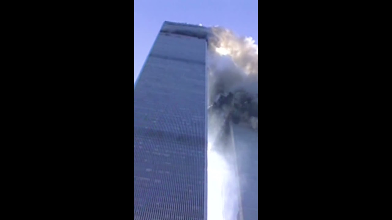 Reporter On Camera As Tower Begins To Collapse