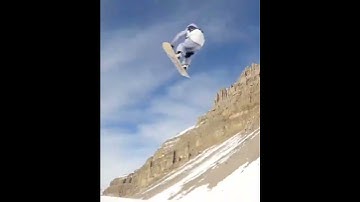 guy shows snowboarding trick at Burton event - 1316517