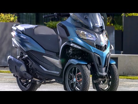 וִידֵאוֹ: Piaggio מציג שינויים ב-MP3