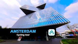 Architecture from bicycle Amsterdam, Netherlands, May 2024, cycling tour