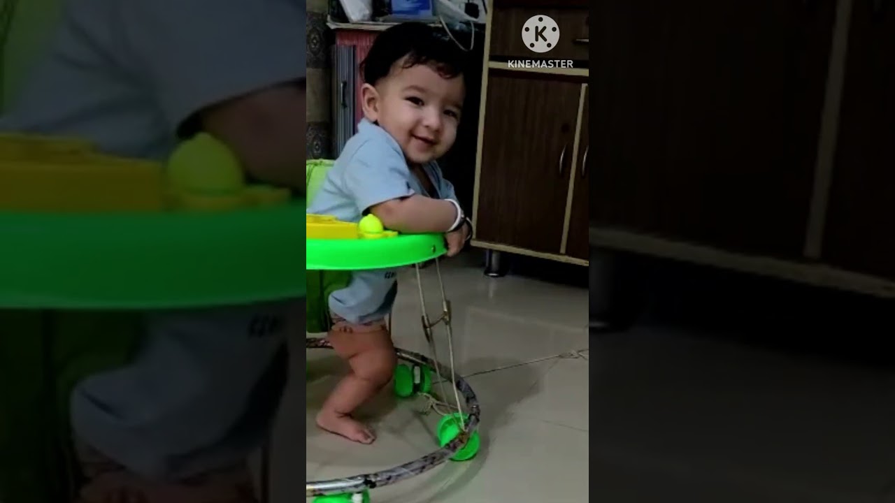 7 Month Old Baby Walking in Walker 