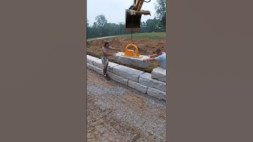 Setting retaining wall blocks #hardscape #concrete #construction #retainingwalls #work #excavator