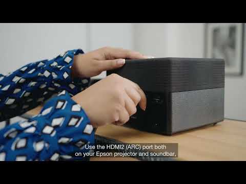 Video: Hvordan tilslutter jeg en soundbar til mit Roku TV?