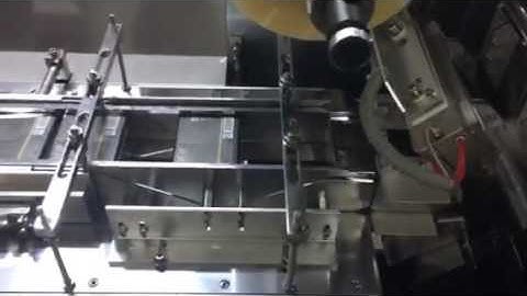 Automatic cellophane overwrapping machine for tea box
