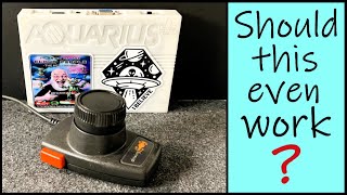 Using an Atari Driving Contoller with the Aquarius+ computer.
