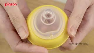 How To Assemble PIGEON SofTouch Peristaltic Plus Nipple onto Nursing Bottle screenshot 1