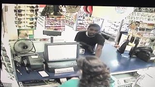 Surveillance video shows man robbing Valero gas station