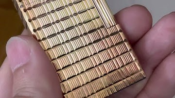 Một cây Dupont bọc vàng mới 99.9%