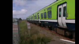 20327 Class DMU Passing kilcoole Beach