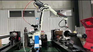 Kawasaki Robotic Workstation for Pipe Flanges with Laser Seam Tracking