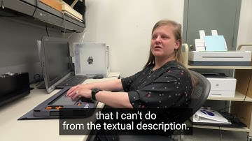 Chancey Fleet demonstrates the Monarch Braille Device at New York Public Library