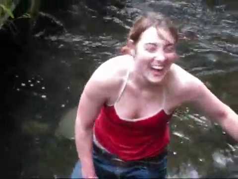 Girl catches fish with bare hands