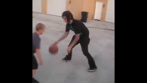 Jimmy "The Rev" Sullivan playing basketball