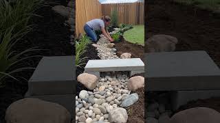DIY Dry Creek Garden Makeover with River Rocks & a Concrete Bridge
