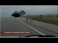 Tractor trailer driver avoids flipping over.