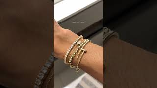 Wrist Stack Bracelets: Pavoi tennis bracelet + Van Cleef Sweet Alhambra + Jared Jewelry + Cartier