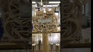 Student designs clock that writes the time every minute