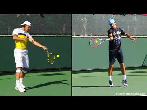 www.fuzzyyellowballs.com This video split-screens Roger Federer and Rafael Nadal's forehands so you can compare their respective techniques. The video is synced at contact. These clips were filmed at the 2009 BNP Paribas Open in Indian Wells, CA ( www.bnpparibasopen.org ). To learn how to hit forehands like Nadal and Federer, visit http !