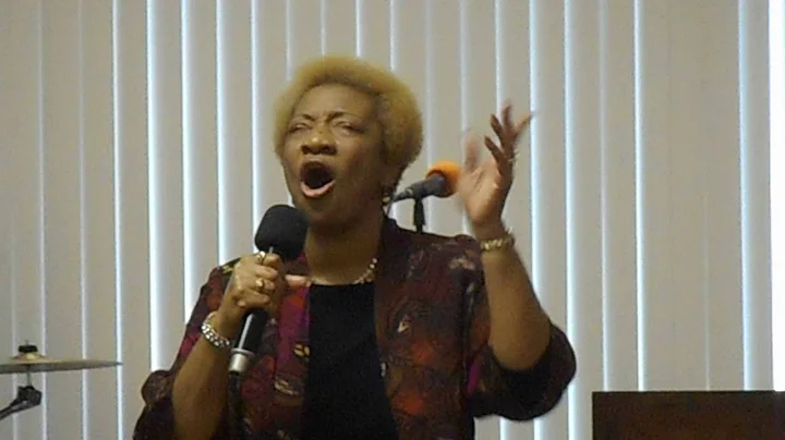 Joyce Byrd  singing  "In This Place".