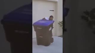 Man catches a Alligator with a trash can