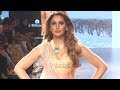 A different looking Nargis Fakhri walks the ramp at Lakme Fashion Week 2017