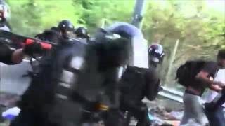 Hungary police attack and beat refugees