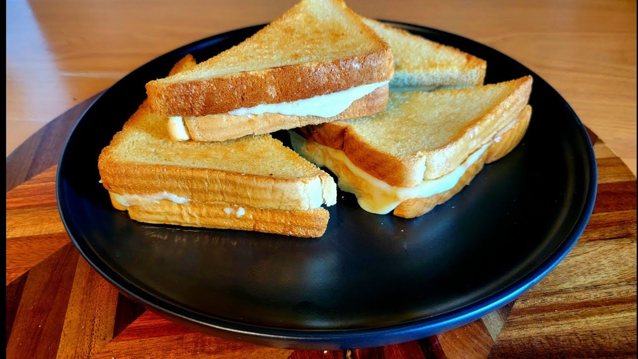 it's a very delicious and simple toasted cheese bread i make for my breakfast
