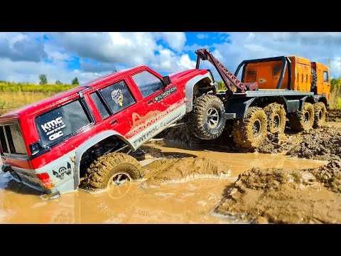 We Evacuate Car with Winch of Jib Boom Crane Kamaz 8x8  Nissan Patrol Stuck in the MUD