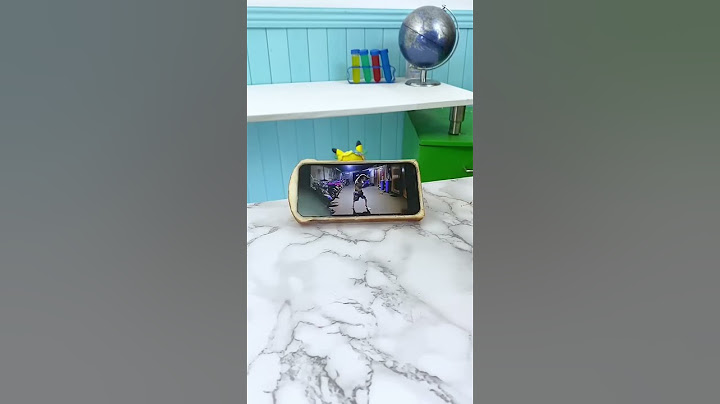 Puff crafts a clever phone stand from paper! See his DIY prowess in action!  #thatlittlepuff