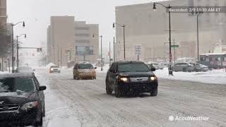 Winter storm closes schools and businesses in Detroit amid dangerous, slippery conditions