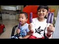 Naik sepeda beli es krim Paddle Pop Duo Anggur