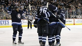 Wheeler snaps OT winner over Rinne's shoulder