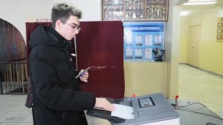 First time voter casts vote in Russian presidential election