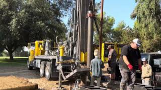 Lining a collapsed water with a new steel liner. Saved the well. It’s how fully operational.