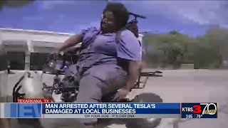 Man arrested after hitting Tesla