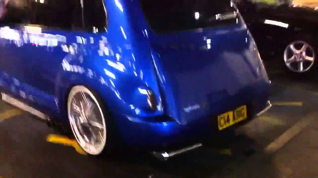 AWESOME Chrysler Pt Cruiser Wire Wheels Electric Blue.