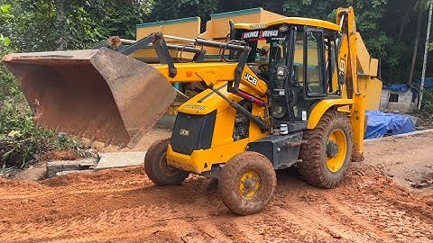 Jcb 3dx transporting muddy soil across draining canal #jcbdozer #jcb #jcb3dx #jcbtractor #jcbstunt
