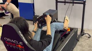 Woman Rockin' High Heels On An F1 Sim As Max Verstappen screenshot 5