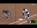 Jonathan Aranda dives to make the tag vs the New York Yankees