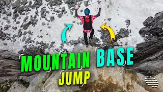 Guy Pulls a Base Jump from a Mountain