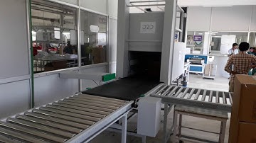 Automatic conveyorized RFID reader