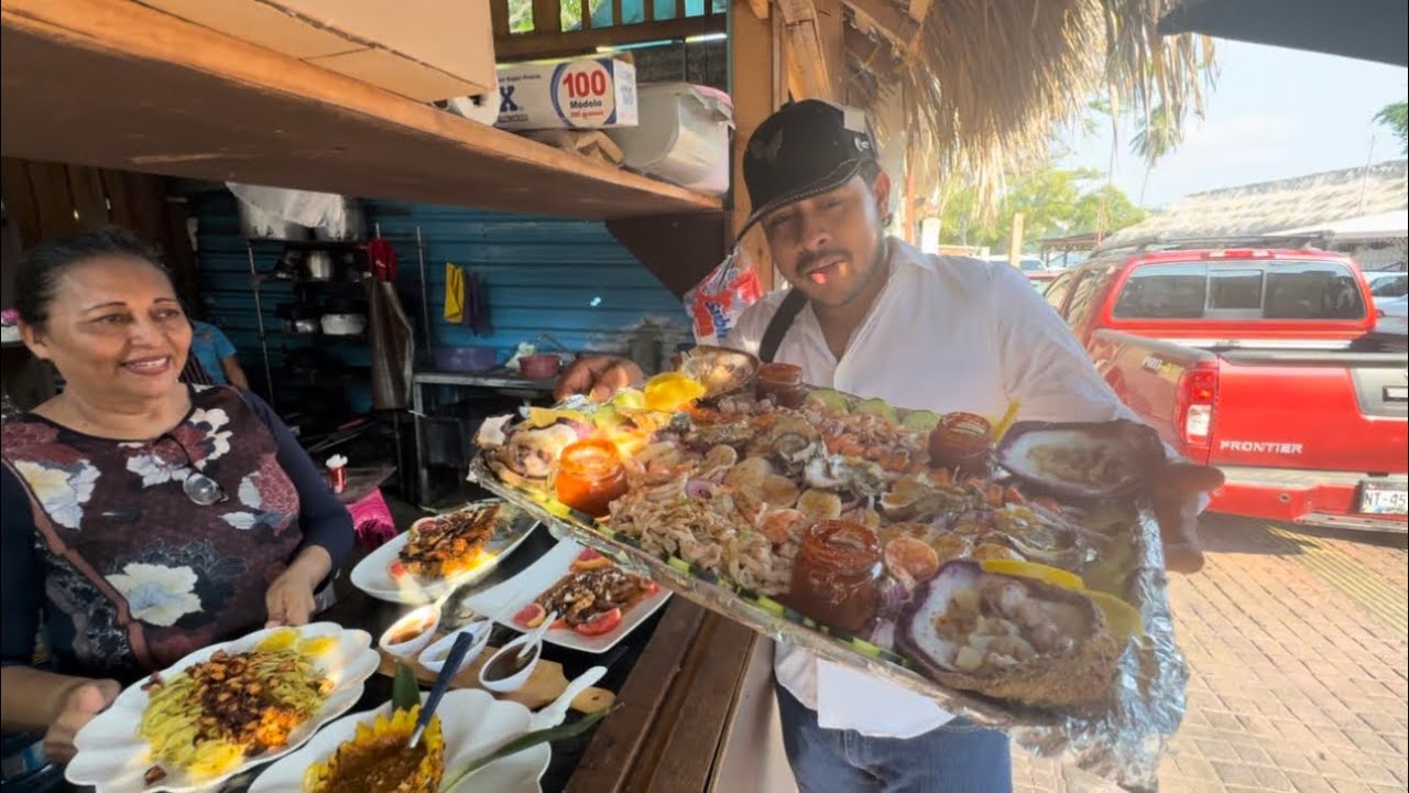 UNA CHAROLA DE MARISCO Y NUEVOS PLATILLOS EN EL RESTAURANTE RINHAS EN ACAPULCO 
