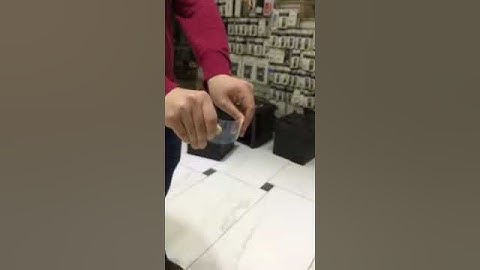 Breaking tempered glass -slow motion