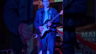 Nico Little and Rhys John Stygal playing funk live at 6th street Austin May 2026