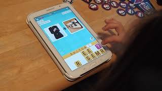 Erin playing the Pictoword word game app, learns how to guess the word and spell screenshot 5